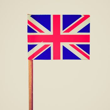 Vintage retro looking Union Jack national flag of the United Kingdom (UK) - isolated over white background