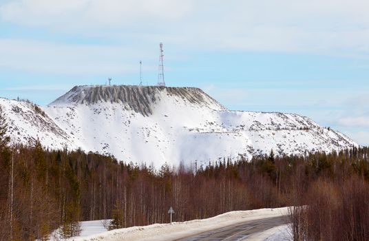 Artificial mountain near Chalmozero. Kuru-Vaara deposit, Kola Peninsula, minerals,feldspar. Russia