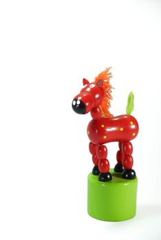 red wooden horse,toy on white scene