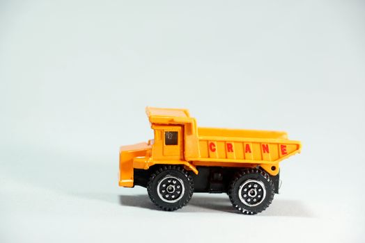plastic model of heavy duty truck on white scene,shallow focus
