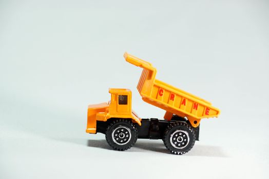 plastic model of heavy duty truck on white scene,shallow focus