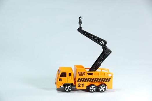 plastic model of heavy duty truck on white scene,shallow focus