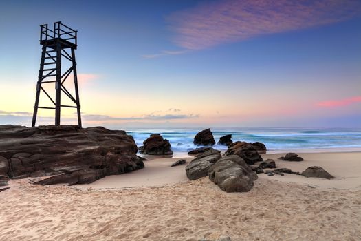 The Shark Tower and jagged rocks at Redhead Beach, NSW Australia