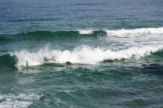 Photo of the Deep Blue Colour Wavy Sea