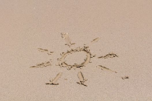 Sun drawing on the sand