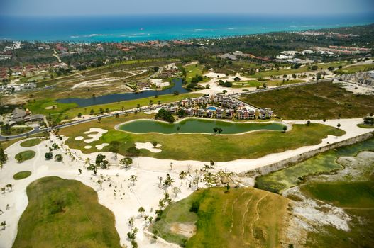 Flying above a golf course at an exotic destination