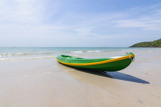 Kayak to the beach. The sea in the background.