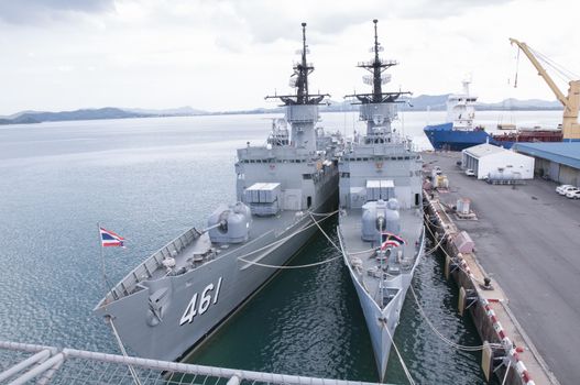 Battleship docked at the harbor. Bow with anchor