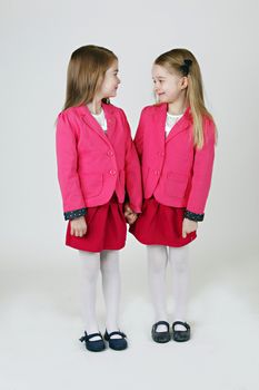 Two young girl ( sisters) in the studio