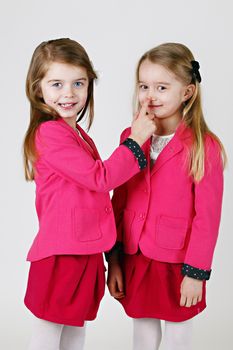 Two young girl ( sisters) in the studio