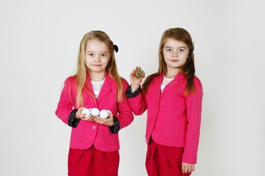 Two young girl ( sisters) in the studio