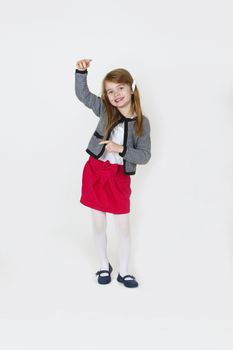 Six years old girl posing in the studio