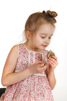 Six years old girl posing in the studio