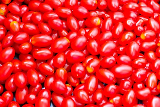 Photo of background with fresh red tomatos