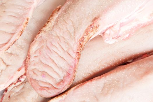 Photo of raw pork tongue in the market place