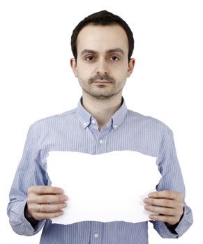 Young man holding a blank piece of paper