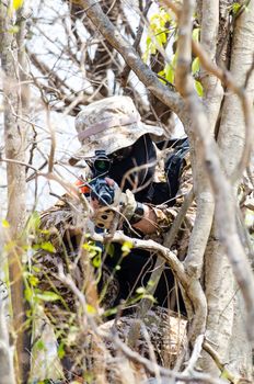 Soldiers snipers attack the enemy from bush