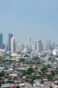Bangkok city with tall buildings and small houses. The residential density.