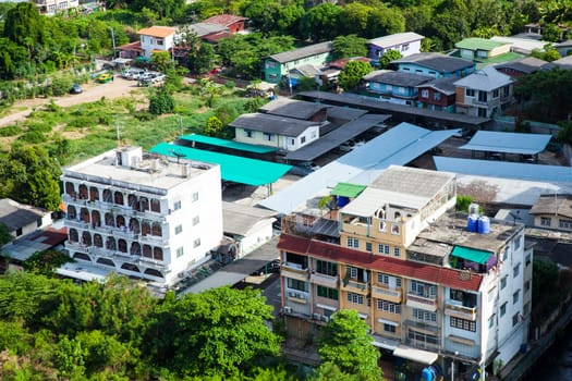 Bangkok city with tall buildings and small houses. The residential density.