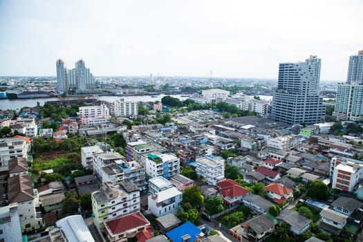 Bangkok city with tall buildings and small houses. The residential density.