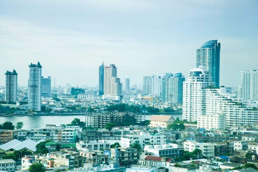 Bangkok city with tall buildings and small houses. The residential density.