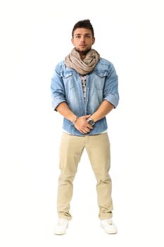 Handsome young man standing with denim shirt and scarf, full length body shot, isolated