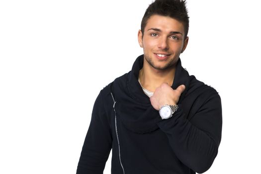 Handsome young man with black sweater on white background looking at camera