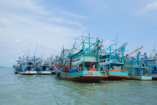 Fishing boats moored alongside the pier are a number of coastal areas.