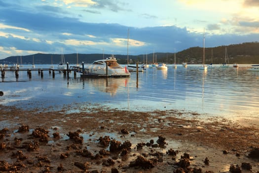 Boat moorings in the late afternoon sun, at Point Frederick, Gosford NSW Australia