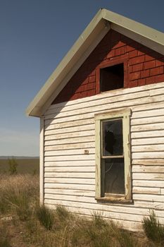 An abandoned farm house uses up valuable farm land