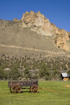 Smith Rock and an old wagon in Oregon State USA