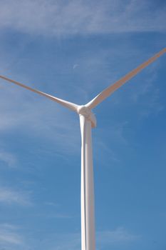 Wind Power Generator against blue sky