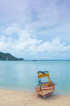 Small fishing boat. Parked on the beach. Ships were made of wood.