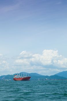 large cargo ship. Moored offshore. Transport near the docks.