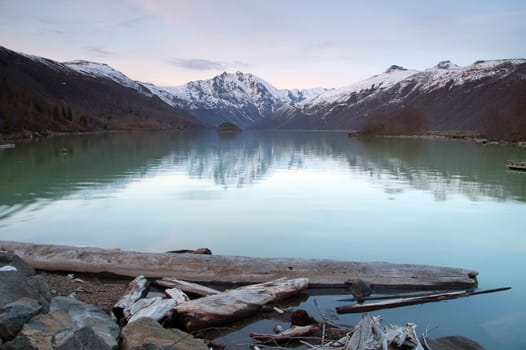 Coldwater Lake before a beautiful mountain range at dusk