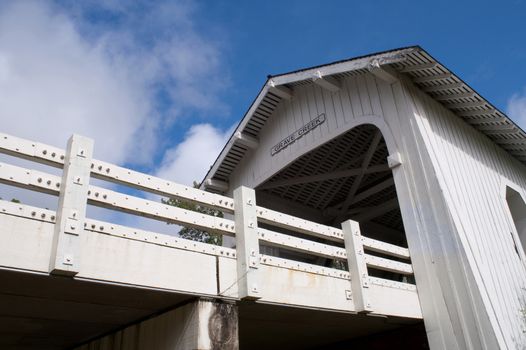 Road emerges from Grave Creek Covered Bridge