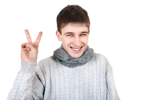 Cheerful Teenager with Victory Gesture Isolated on the White Background