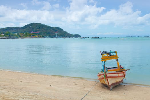 Small fishing boat. Parked on the beach. Ships were made of wood.