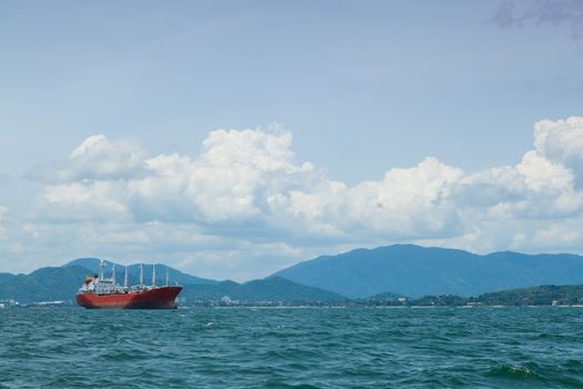 large cargo ship. Moored offshore. Transport near the docks.