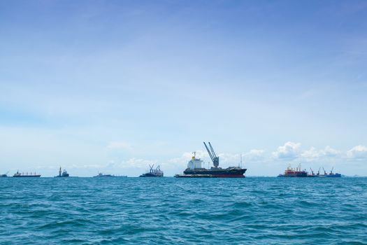 large cargo ship. Moored offshore. Transport near the docks.