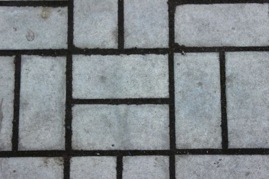 Rectangular paving slabs laid out in the form simmetrichnymh forms