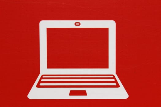 On a red background shows the icon "Computer"