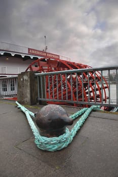 PORTLAND, OREGON - APRIL 5, 2014: Day of the dedication ceremony for the American Empress tiedown along the seawall of Portland Oregon downtown waterfront. American Empress is the largest riverboat west of the Mississippi.