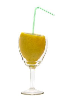 cut a lemon in a glass with a straw for juice