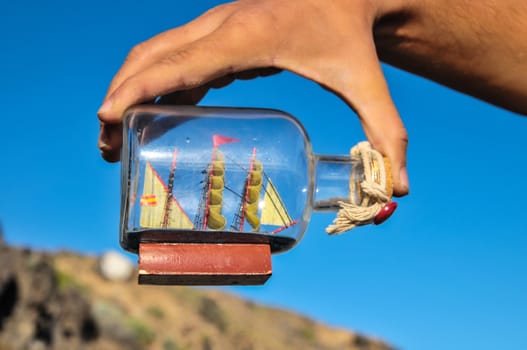 Sailing Boat Vintage Vessel on a Caucasian Hand