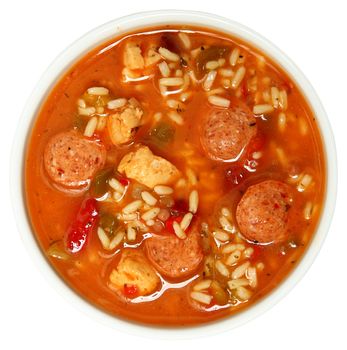 Bowl of Cajun Spicy Chicken and Sausage Gumbo Soup Over White