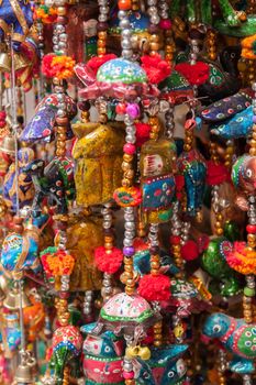 Colorful handmade hanging decorative chains in a local market India