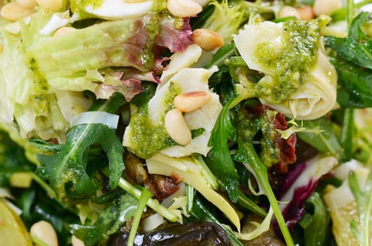 The salad with rucola and pine nuts