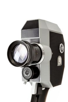 Old 8mm movie camera isolated on white background 