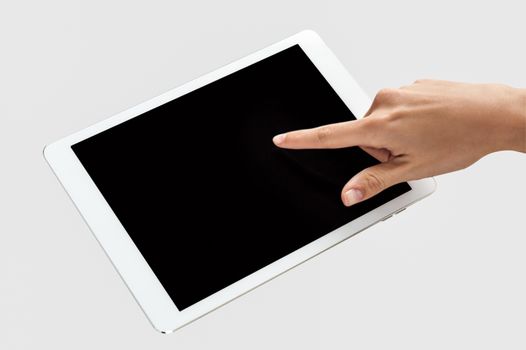Finger pointing on tablet screen